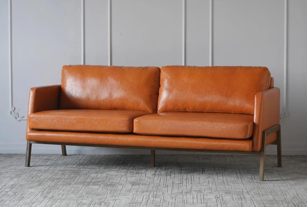 Elements | Cognac Faux Leather + Natural Elm Legs Sofa Decor Elements